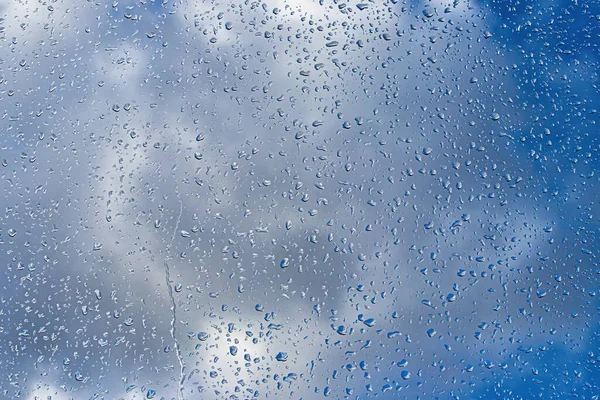 Rain Drops Window Glasses Surface Blue Sky Clouds Background Natural — Stock Photo, Image