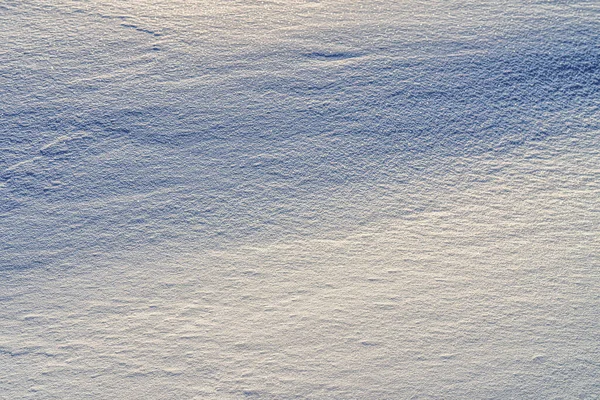 太陽の光で照らされた雪の質感 冬の背景 — ストック写真