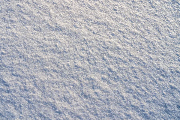 太陽の光で照らされた雪の質感 冬の背景 — ストック写真