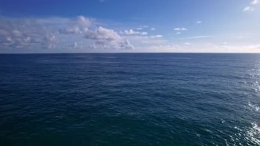 Beautiful sea summer landscape Waves sea water surface High quality video Bird's eye view. Drone fly over sea surface