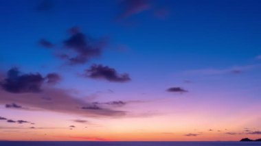 Time lapse of Majestic sunrise sky over sea landscape. Amazing light of nature cloudscape sky colorful background. Beautiful color of nature sky clouds