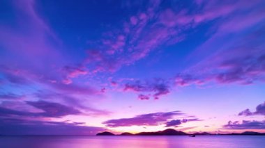 Time lapse of Majestic sunrise sky over sea landscape. Amazing light of nature cloudscape sky colorful background. Beautiful color of nature sky clouds