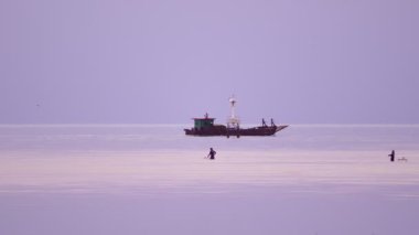 fisherman Trap nets for fish at low tide at Phuket Thailand