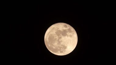 Full moon in the sky at night Amazing moon with a tele lens photography video