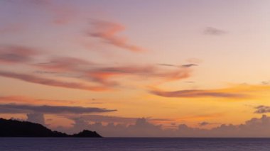 4K Time lapse of Majestic sunset or sunrise landscape Amazing light of nature cloudscape sky and Clouds moving away rolling colorful dark sunset clouds Footage timelapse.Nature environment background