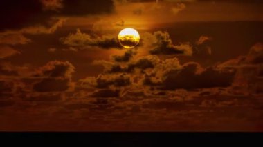 4K Time lapse of Majestic sunset or sunrise landscape Amazing light of nature cloudscape sky and Clouds moving away rolling colorful dark sunset clouds Footage timelapse.Nature environment background