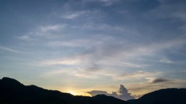 4K Time lapse of Majestic sunset or sunrise landscape Amazing light of nature cloudscape sky and Clouds moving away rolling colorful dark sunset clouds Footage timelapse.Nature environment background
