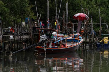 Long Tail fishing boat in the pier Phuket Thailand