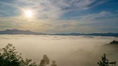 Timelapse sun is rising above the endless sea of fog until the horizon, Amazing nature landscape, 4K Hyperlapse drone in sky sunrise or sunset,Amazing nature background