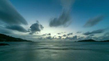 Time Lapse nature Beautiful Light sunrise or sunset sky colorful clouds scenery. Sky with reflection on sea water surface. Amazing clouds in sunrise sky background