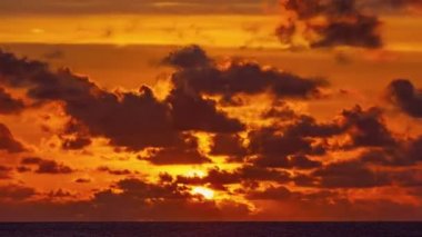 Time Lapse nature Beautiful Light sunrise or sunset sky colorful clouds scenery. Sky with reflection on sea water surface. Amazing clouds in sunrise sky background