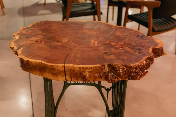 Handmade epoxy resin round wood table. Reclaimed wood furniture and live edge table made from fallen trees