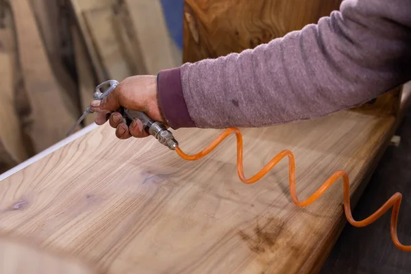 Man Blowing Dust Surface Wooden Table Workshop Handmade Wooden Product — Zdjęcie stockowe