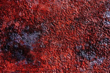 Rusty iron metal texture surface of the old metal with scratches and cracks. Rust iron metal with traces of a paint. Rust iron metal surface with vibrant colors.