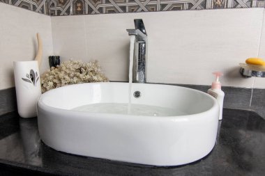 Closeup view of Vanity Sink in modern Washroom.