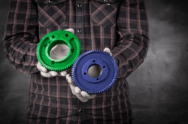 Professional Holding Two Gears Blue Green Color Solution Concept — Stockfoto