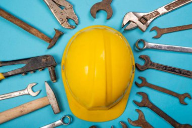 Happy labor day concept with safety cap and hardware tools.