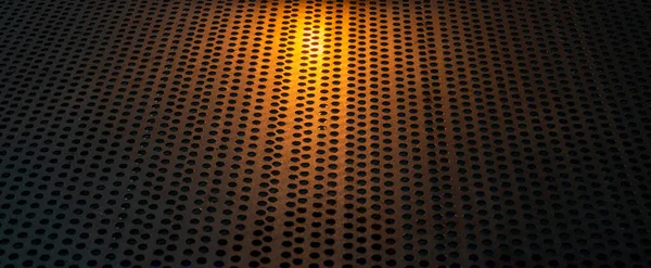 バナーの上部にオレンジ色の光が入っている金属板の背景 — ストック写真