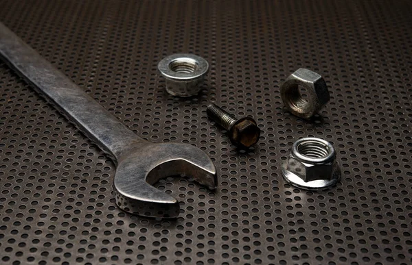 Spanner and bolts on hardware tools concept.