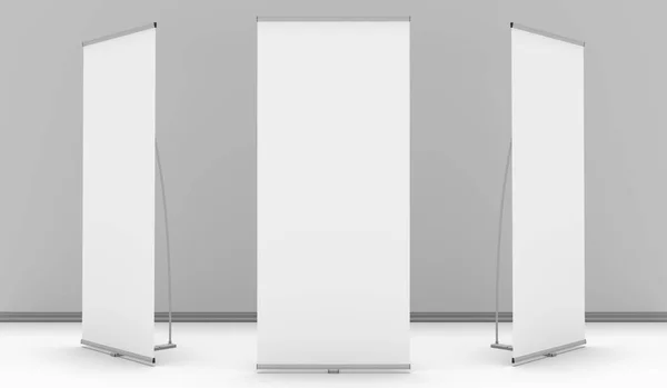 Exhibition Banner Stand arrangement in front of a grey wall with wall skirt and white floor.