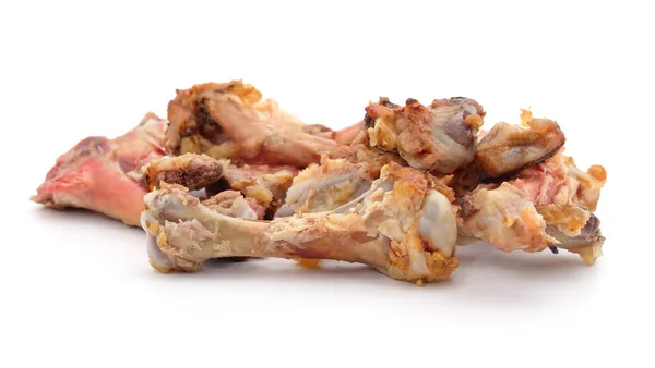 Pile of chicken bones isolated on a white background.