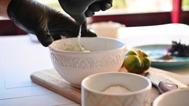 Chef mixing dressing prepared with Greek yogurt — Stock Video
