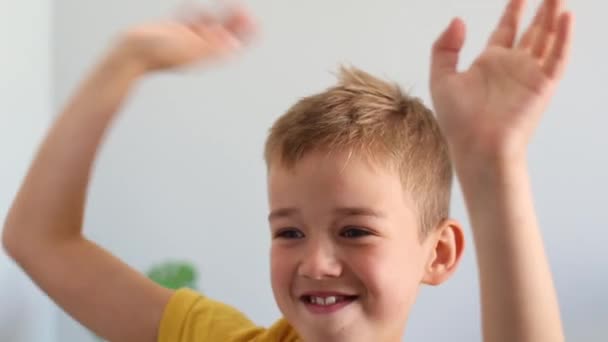 Boy doing pantomime at home — Stock Video