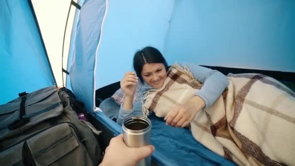 Girl Tourist Sleeps Tent Guy Comes Tent Gives Girl Bowl — Vídeos de Stock