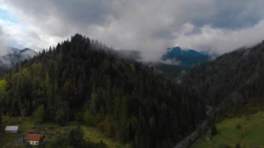 Boat floating on a mountain river. Rafting on a mountain river top view. 4k