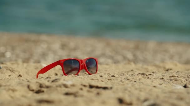Womens Sunglasses Lie Sand Background Sea Summer Holiday Concept Travels — Video