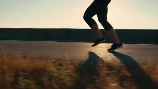 Woman Running Road Sunset Silhouette Running Female Legs Girl Jogging — Vídeos de Stock