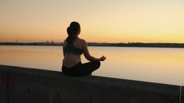 Silhouette Girl Meditating Lake Sunset Feeling Calmness Peace Side View — Video
