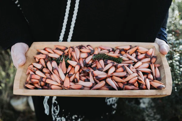 Traditional Man Holding Rustic Wooden Trough Chilean Pine Nuts Pehuen — Fotografia de Stock