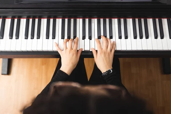 Top View Womans Hands Playing Piano Reading Sheet Music High — Fotografia de Stock