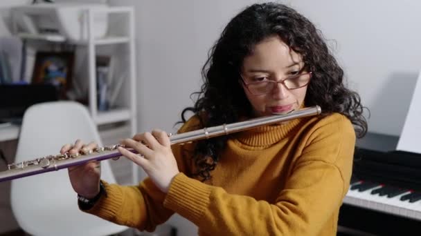 Brunette Woman Wearing Yellow Sweater Playing Transverse Flute High Quality — 图库视频影像