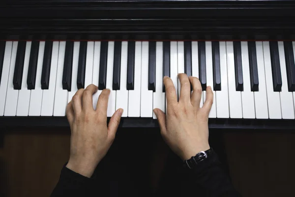 Top View Womans Hands Playing Piano Reading Sheet Music High — Fotografia de Stock