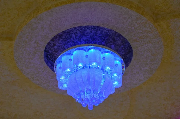 closeup of down light on white ceiling