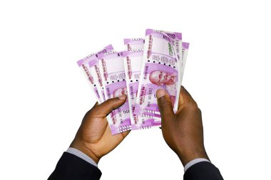 Elinde 3D tutan takım elbiseli Kara Eller 2000 Hint Rupisi yaptı.