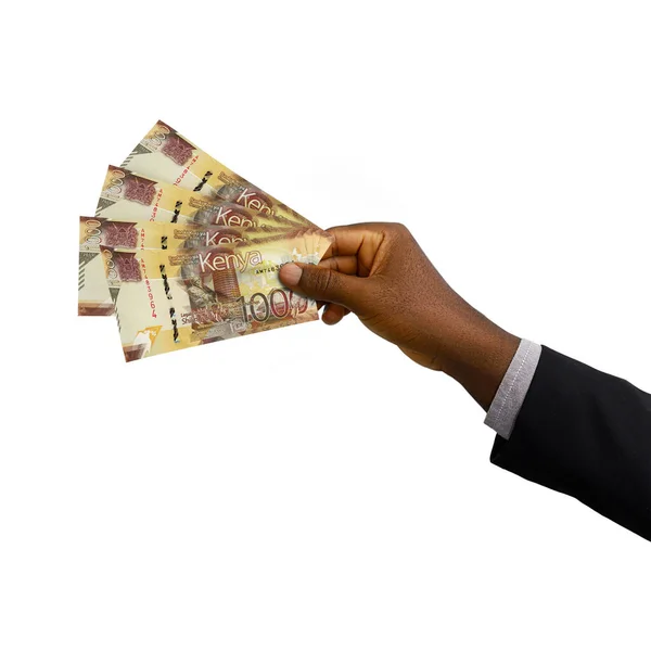 黑手手持西服3D渲染肯尼亚先令纸币 白色背景孤立 — 图库照片