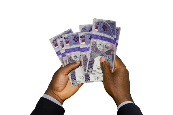 黑手手持3D渲染卡塔尔里亚尔钞票 — 图库照片