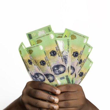 Black hands holding 3D rendered 500000 Vietnamese Dong notes. closeup of Hands holding 500000 Vietnam currency