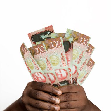 Black hands holding 3D rendered New Zealand dollar notes. closeup of Hands holding New Zealand currency notes