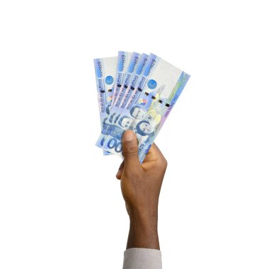Black Hand holding 3D rendered 1000 Philippines peso notes isolated on white background