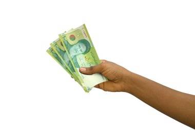 Fair hand holding 3D rendered 10000 Iranian rial notes isolated on white background