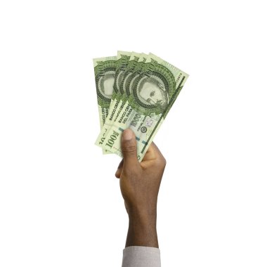 Black Hand holding 3D rendered 100000 Paraguayan guarani notes isolated on white background