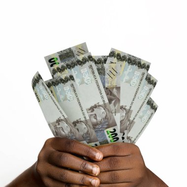 Black hands holding 3D rendered 200 Brazilian reais notes. closeup of Hands holding Brazilian real currency notes