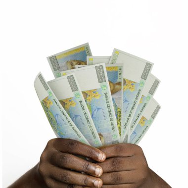 hands holding 3D rendered Djiboutian franc notes. closeup of Hands holding Djiboutian currency notes