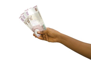 Fair hand holding 3D rendered Azerbaijani manat notes isolated on white background