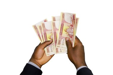 Black Hands in suit holding 3D rendered Afghan afghani notes