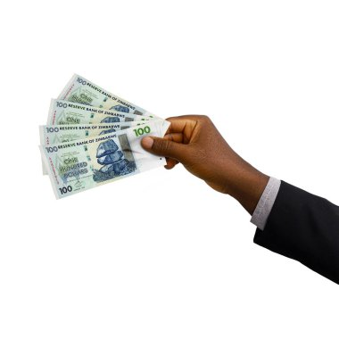 Black Hand with suit holding 3D rendered 100 Zimbabwean dollar notes isolated on white background